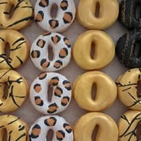 Leopard print and gold decorated donuts for a party donut wall display
