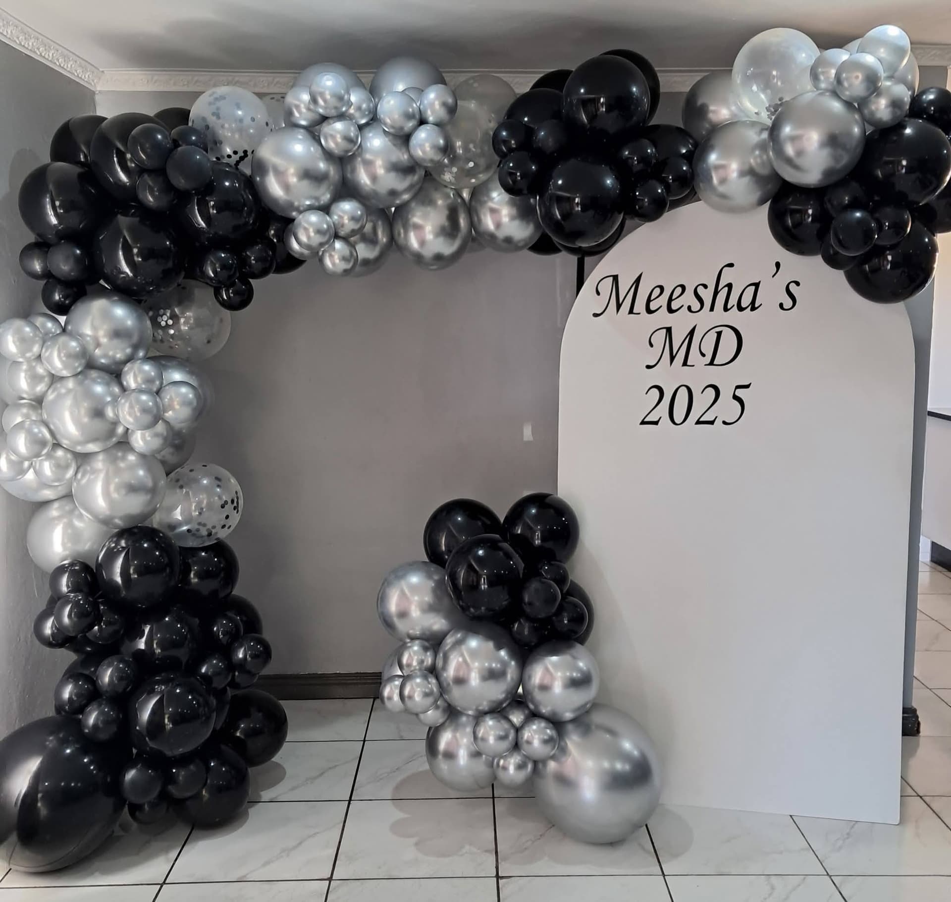 Elegant black and silver balloon arch for Meesha's Matric Dance 2025