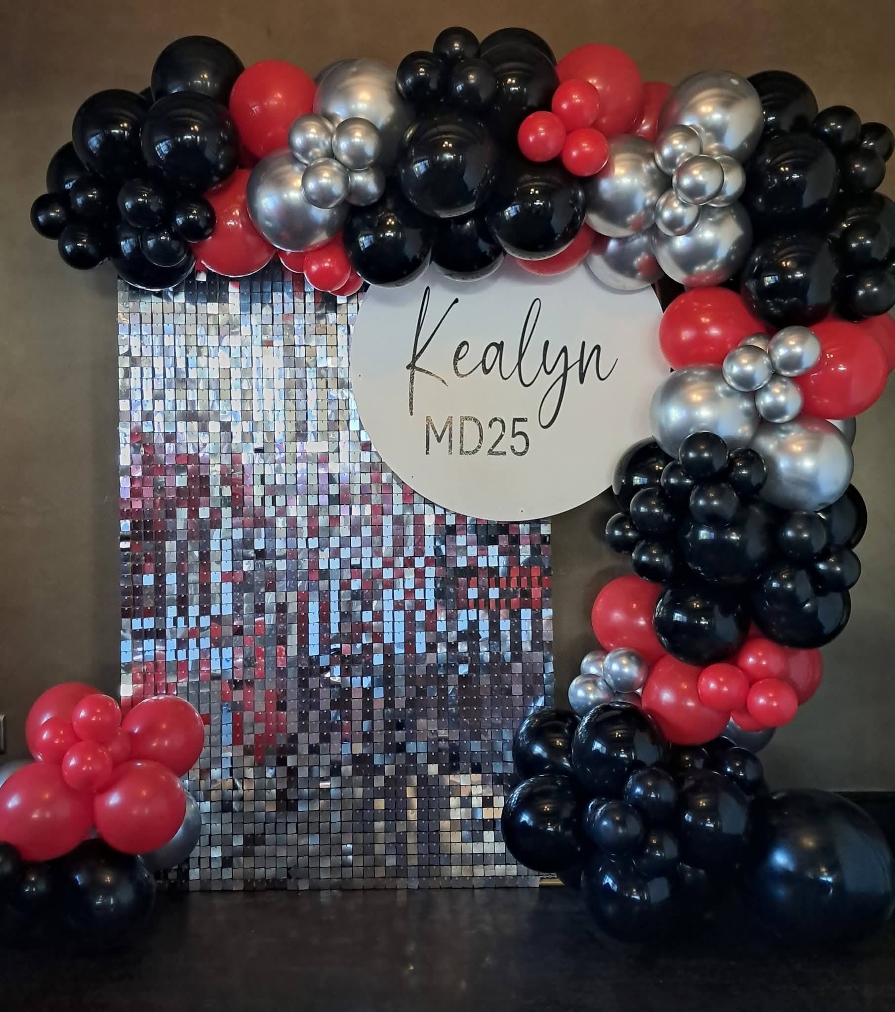 Kealyn MD25 red, black and silver balloon arch with shimmer wall